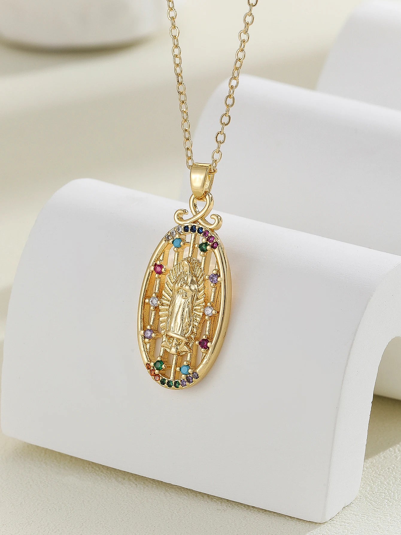 Gigi's Santa Maria necklaces in colorful religious fashion