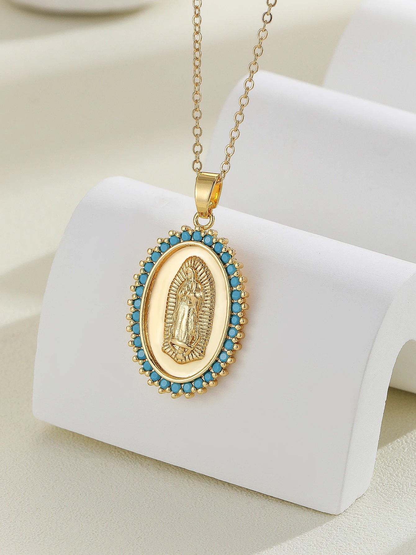 Gigi's Santa Maria necklaces in colorful religious fashion