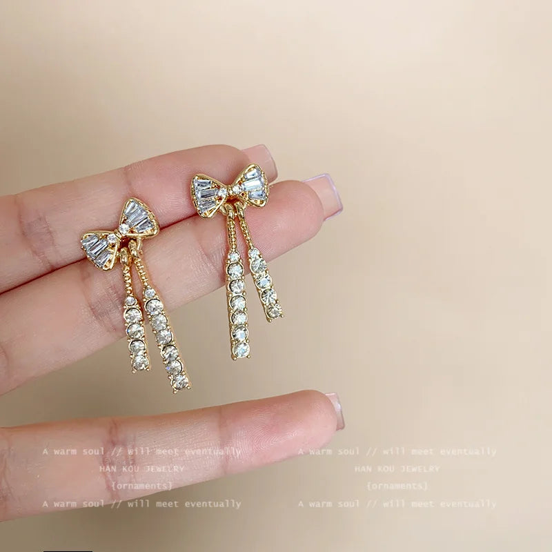 Gigi's Shiny Bow Stud Earrings
