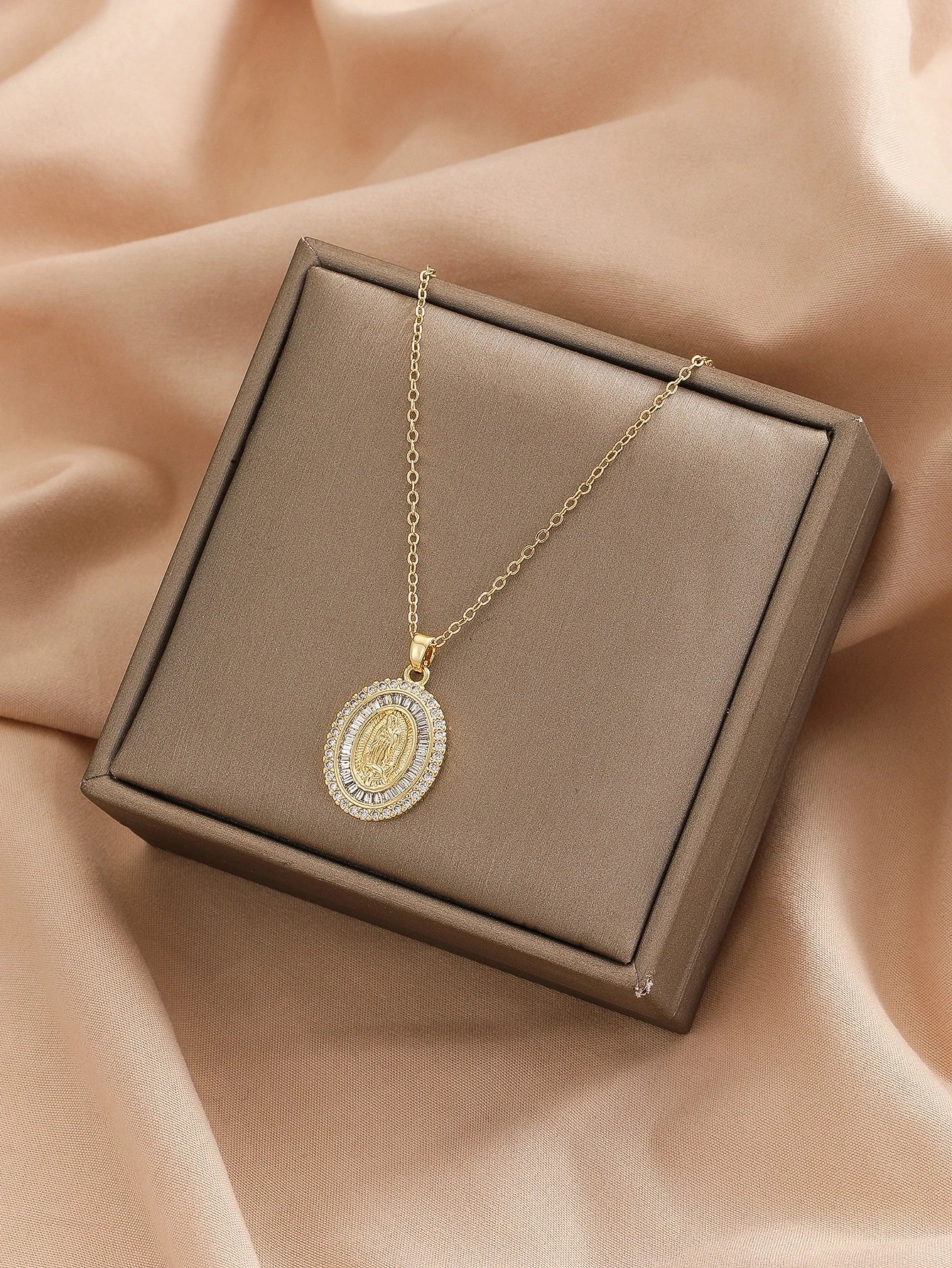 Gigi's Santa Maria necklaces in colorful religious fashion