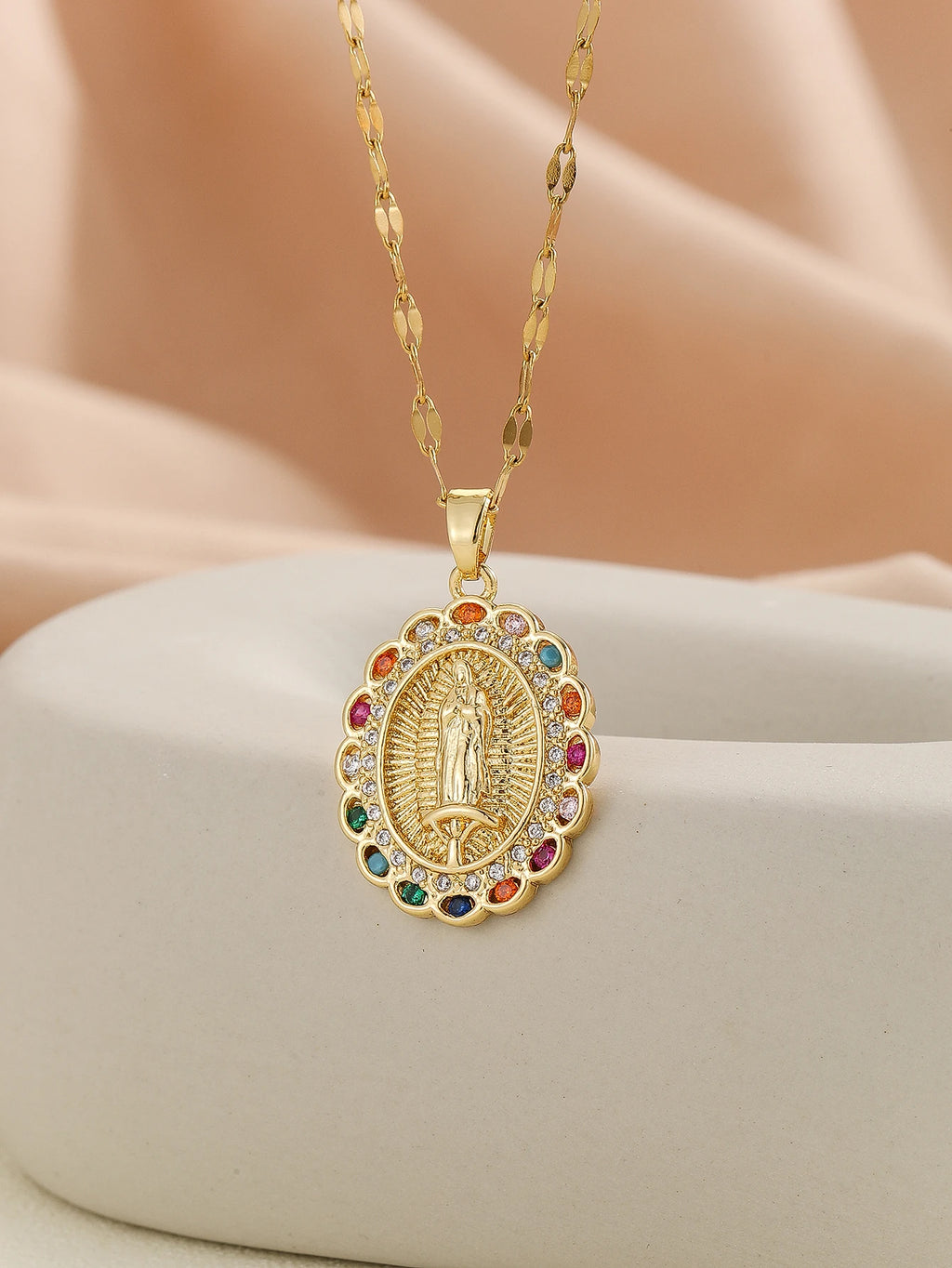 Gigi's Santa Maria necklaces in colorful religious fashion