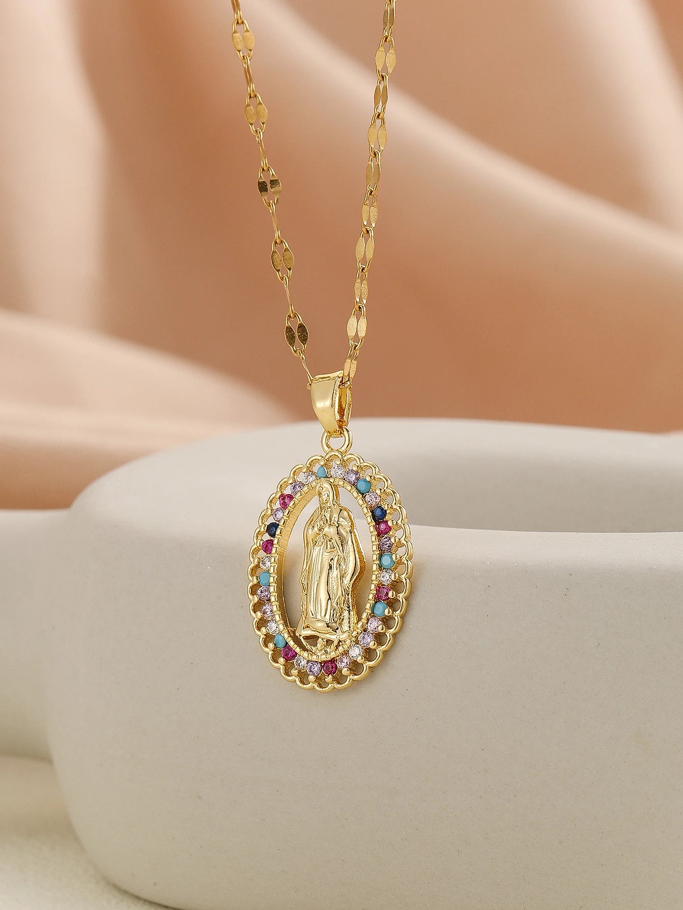 Gigi's Santa Maria necklaces in colorful religious fashion