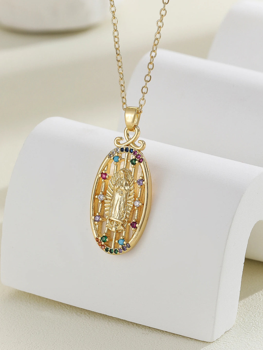 Gigi's Santa Maria necklaces in colorful religious fashion