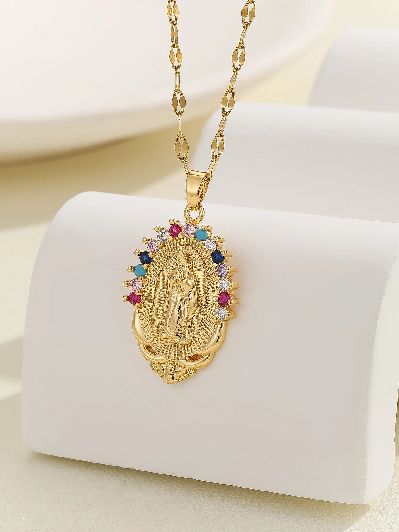 Gigi's Santa Maria necklaces in colorful religious fashion
