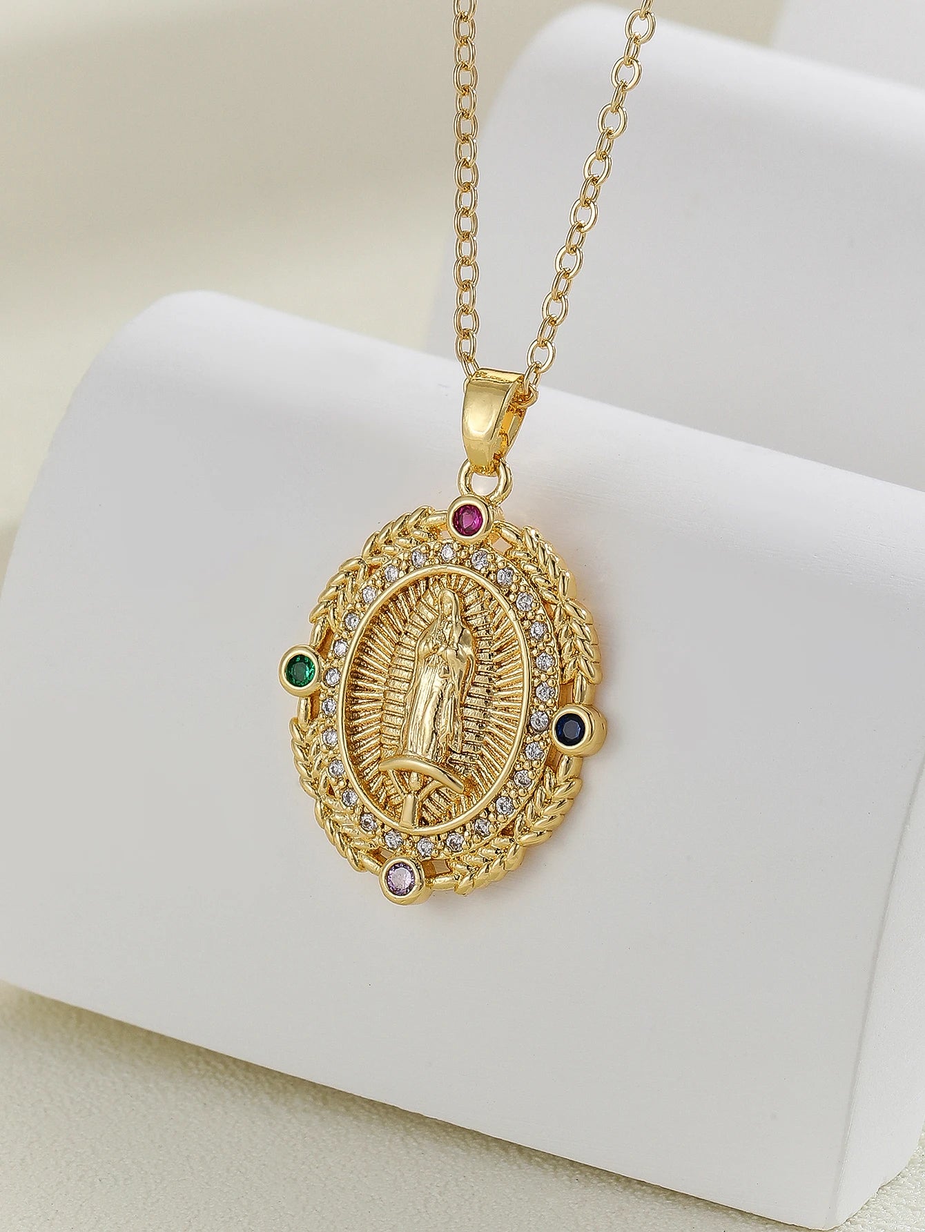 Gigi's Santa Maria necklaces in colorful religious fashion