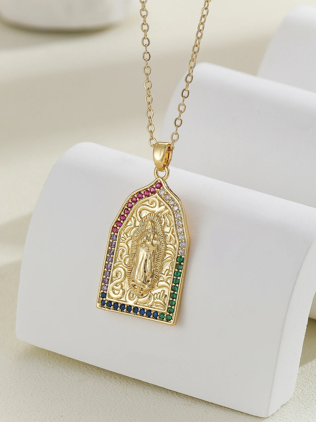 Gigi's Santa Maria necklaces in colorful religious fashion