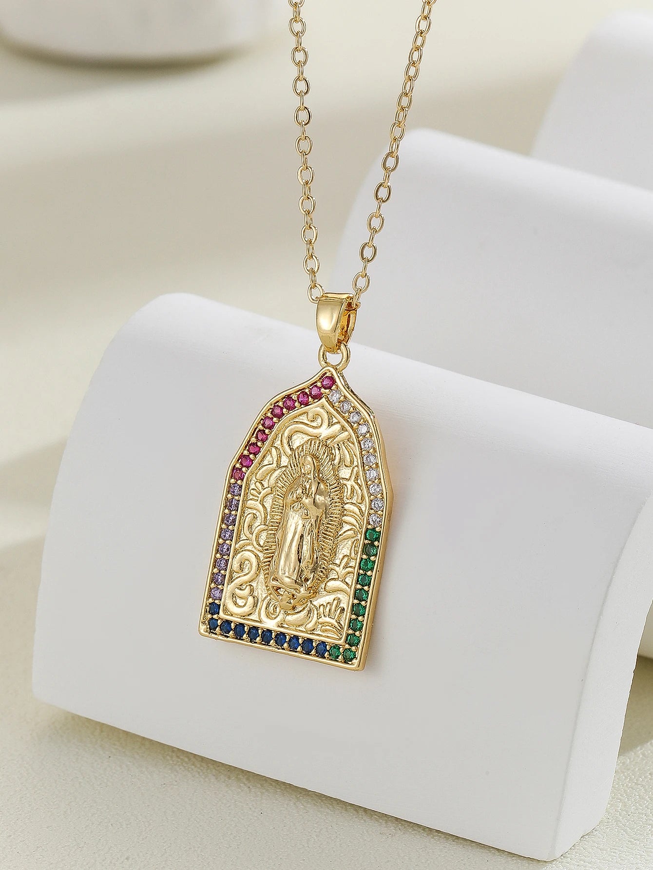 Gigi's Santa Maria necklaces in colorful religious fashion